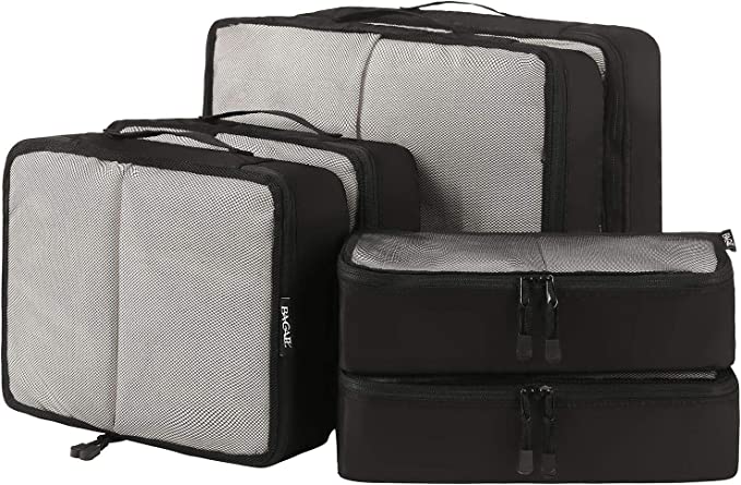 Various sized packing cubes in the color black.
