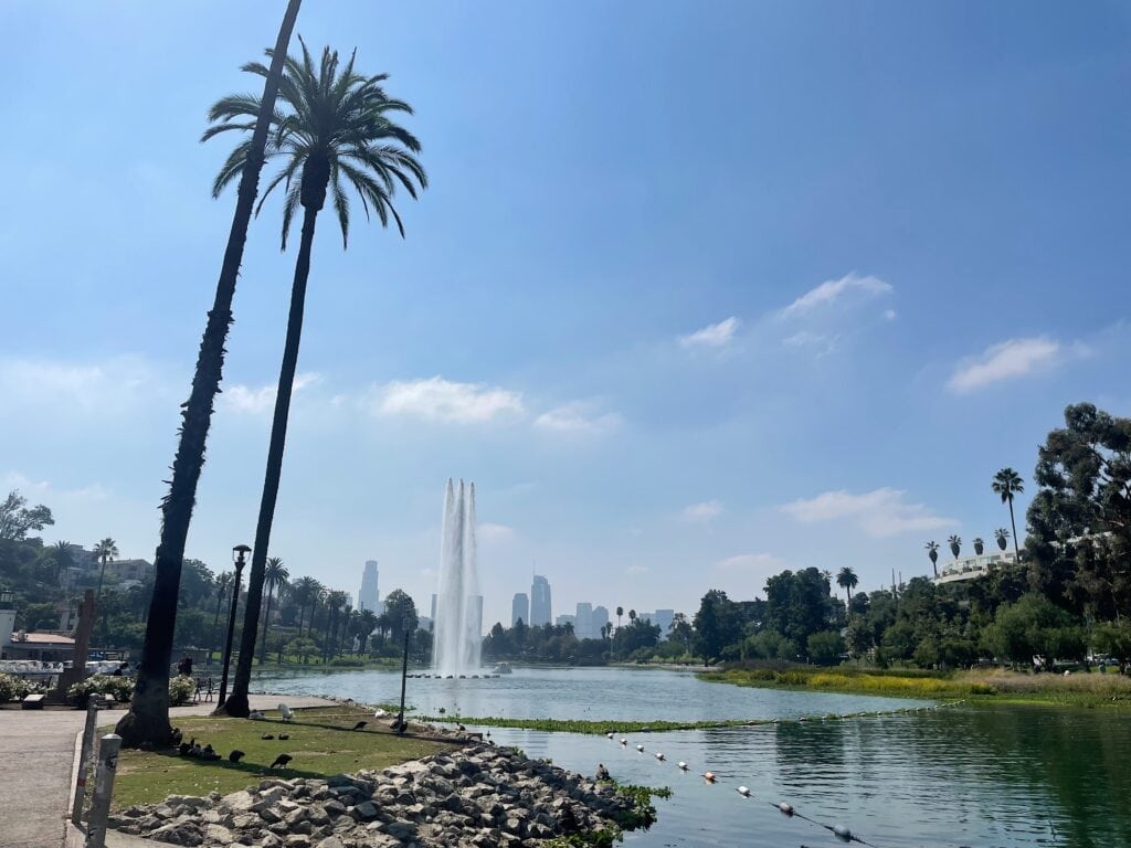 A large waterfall in the center of a pond at Echo Park.